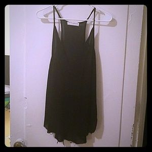 Black knit tank top. Deep V in front & racerback.